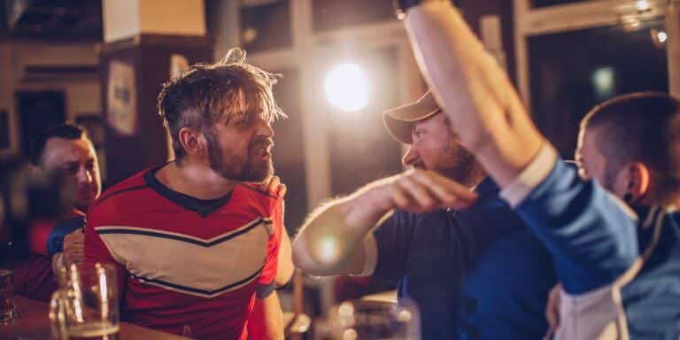 drunk men fighting on a cruise