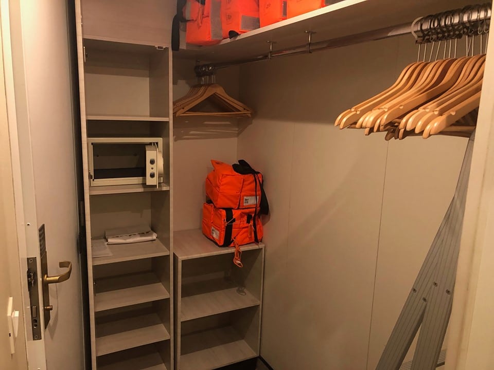 storage in wardrobe area in Britannia inside cabin