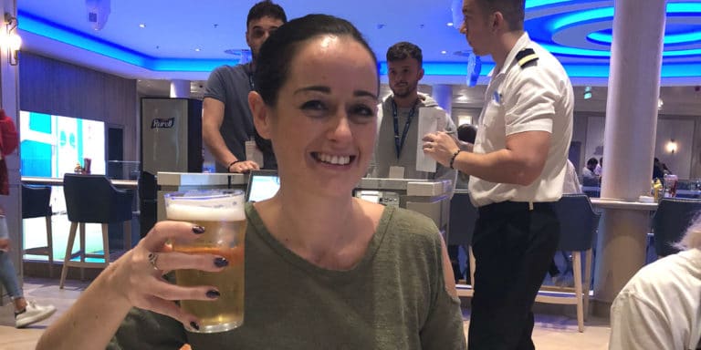 enjoying a beer on Norwegian Encore