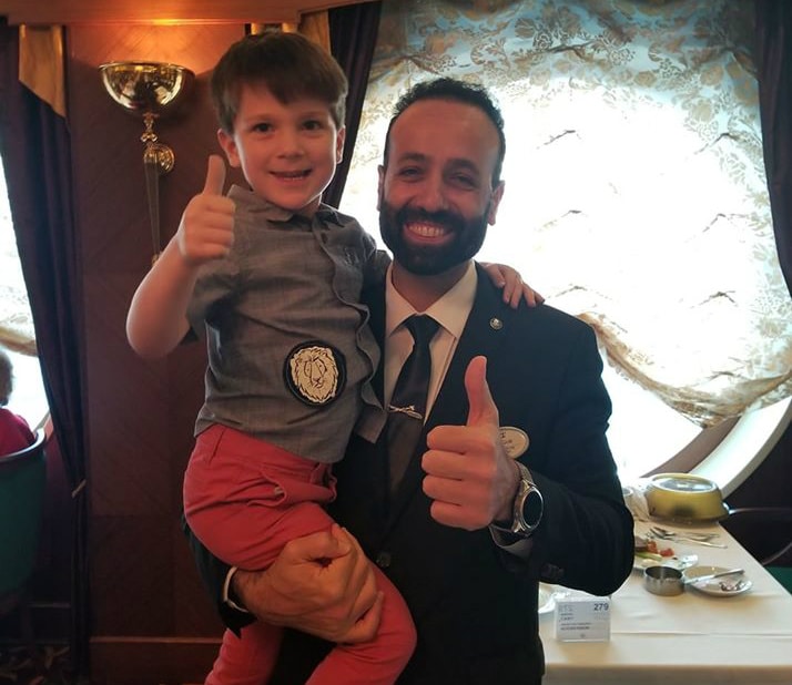 boy with Royal Caribbean waiter