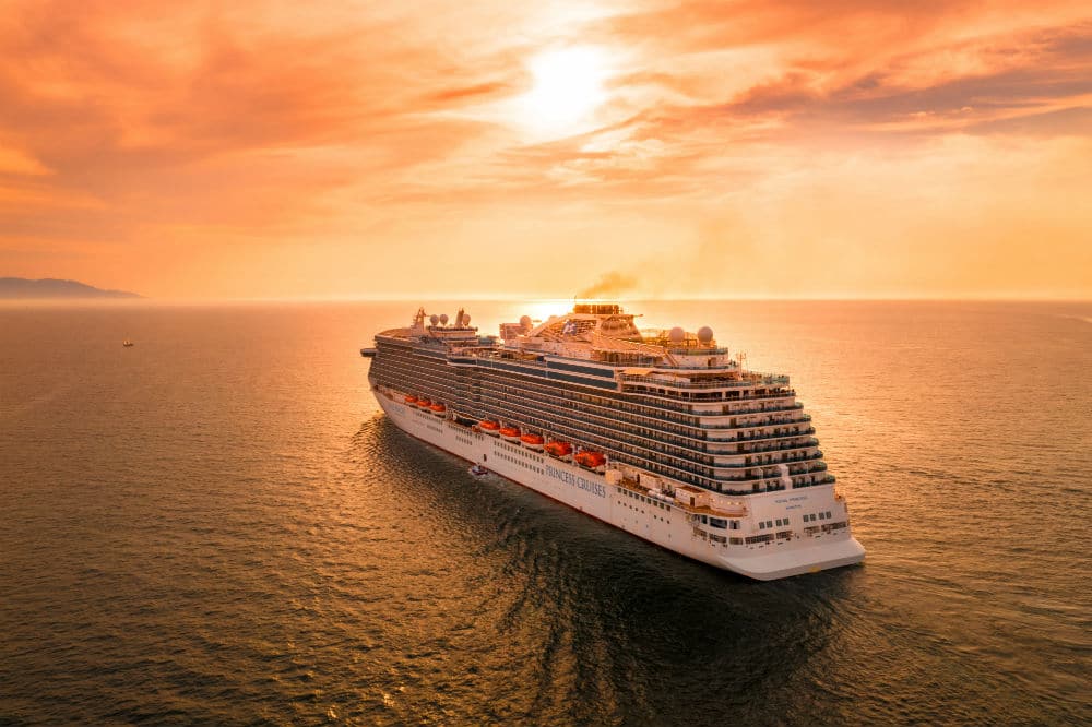 Princess cruises ship sailing into sunset