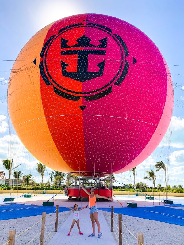 Leonie and I at CocoCay in front of the helium balloon