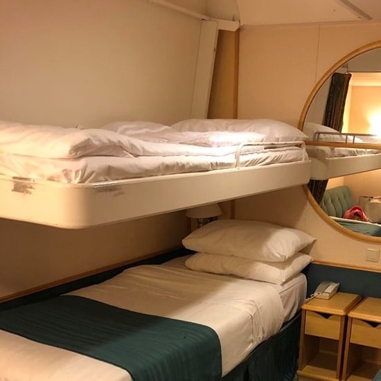 Pullman bed with small guard rail on Mariner of the Seas