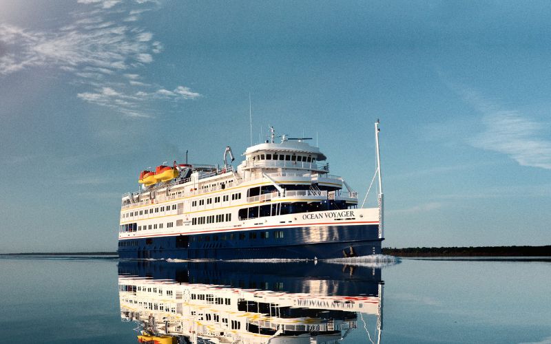 Ocean Voyager cruise ship sailing on the lake