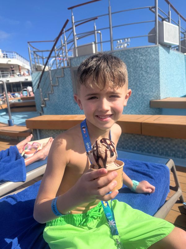Child with an ice cream on a cruise