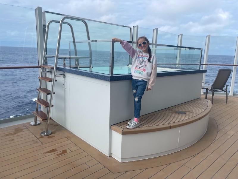 My daughter with the hot tub on Iona