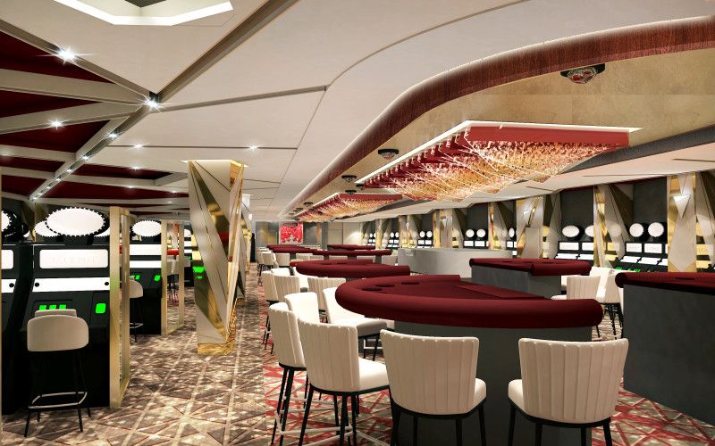 An upscale casino on a Celebrity Cruises ship featuring gaming tables and slot machines, with a contemporary design that includes stylish overhead lighting and luxurious decor. The environment conveys a high-end gaming experience with attention to design and comfort.