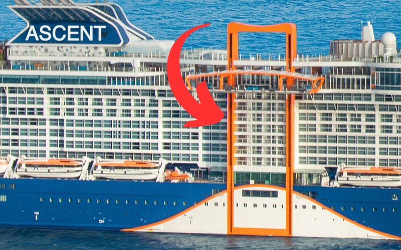 The cruise ship Celebrity Ascent at sea, highlighted by a large red arrow, with a prominent orange structure in the foreground possibly part of a port or marine navigation installation.