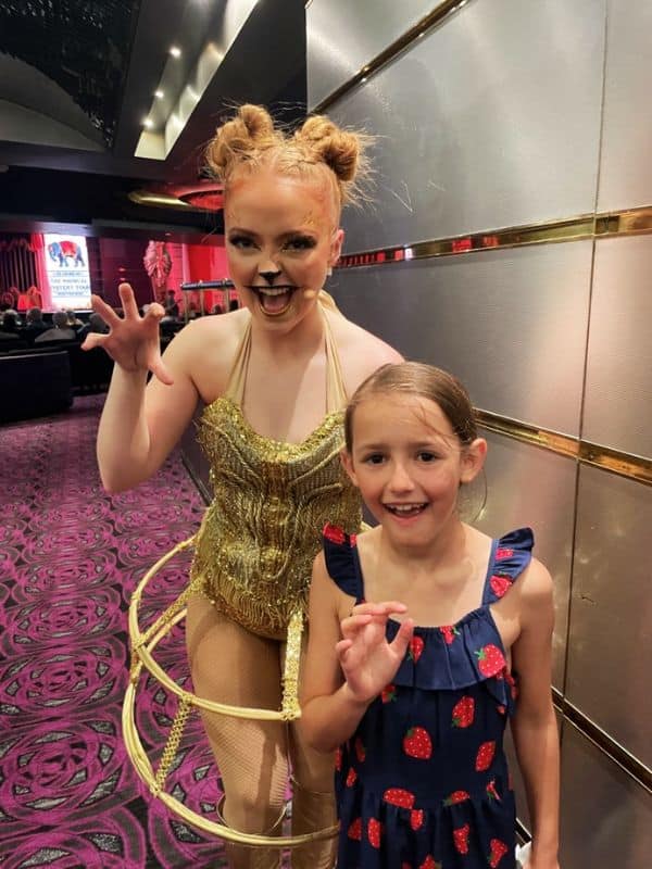 My daughter meeting one of the performers outside of the theatre