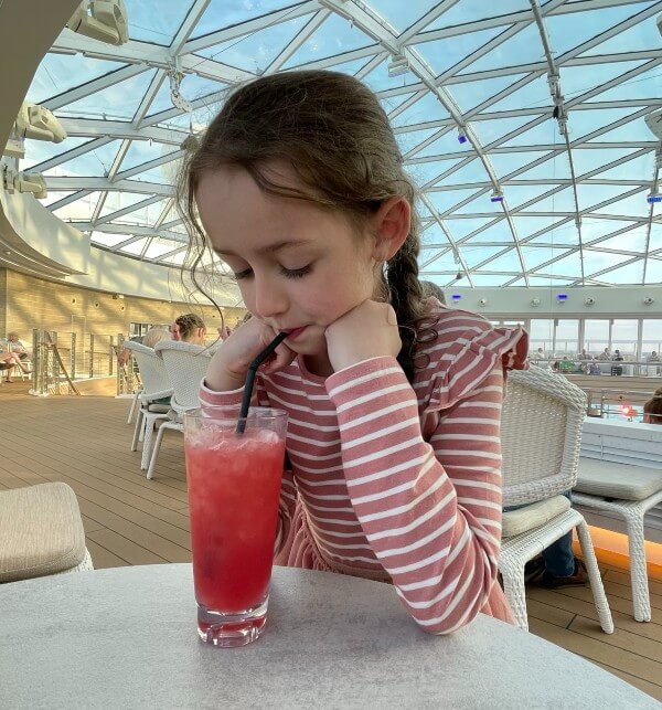 Daughter drinking mocktail on Iona