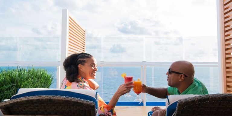 Couple drinking on Mardi Gras' deck