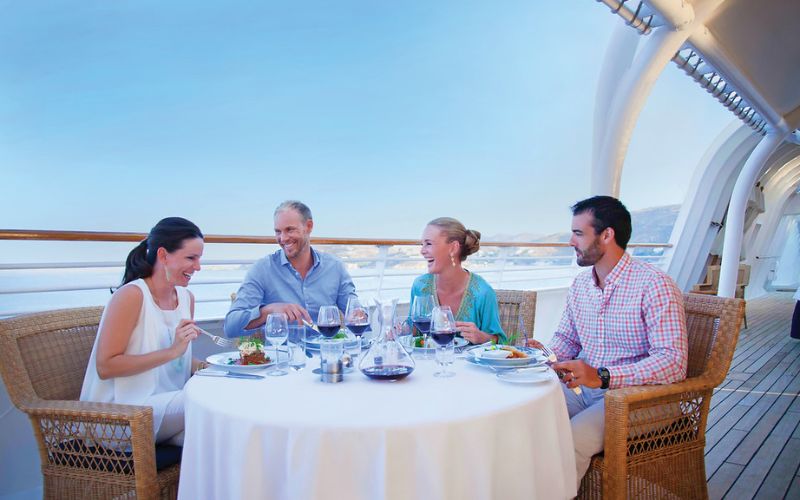 people on a SeaDream cruise eating food