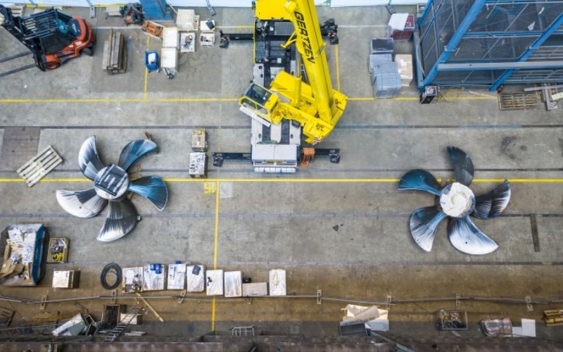 Propellers getting their finishing touches before being placed on Spectrum of the Seas