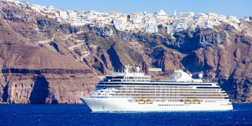 Cruise Ship At Santorini Island