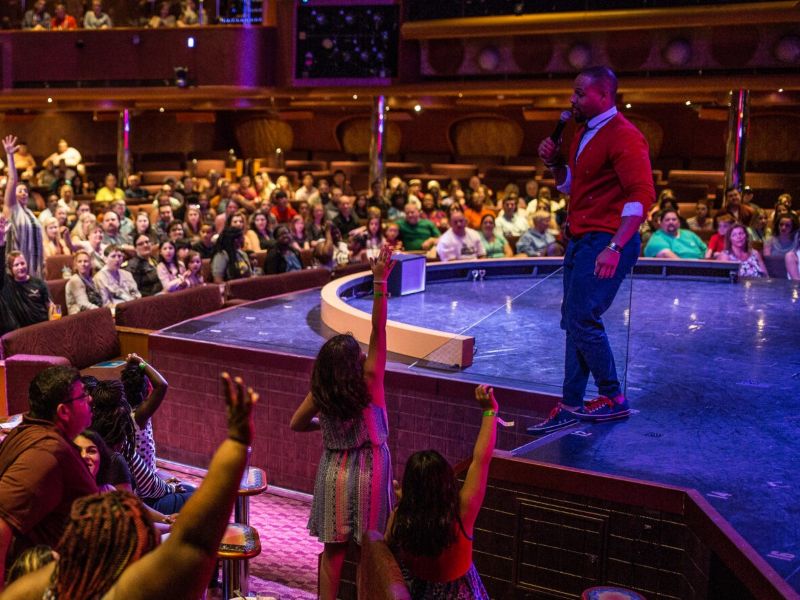 Carnival cruise director onstage