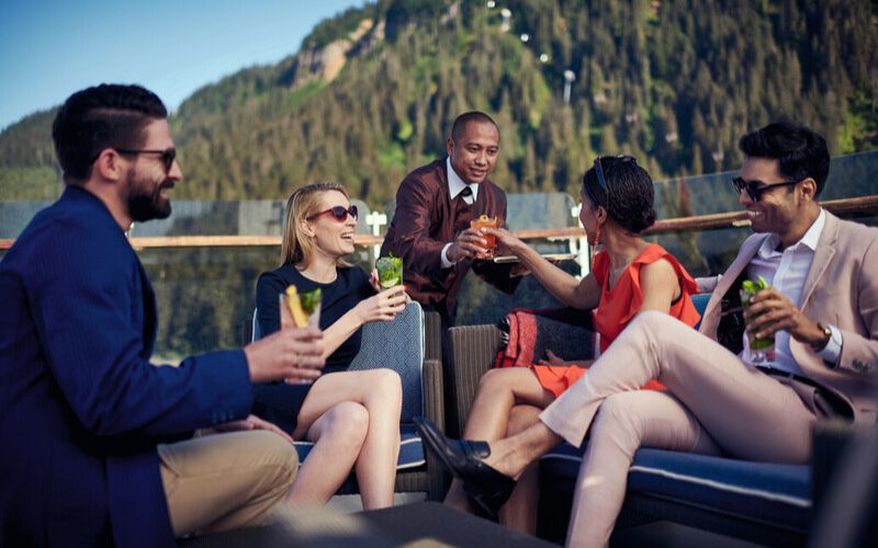 Cunard guests drinking on deck