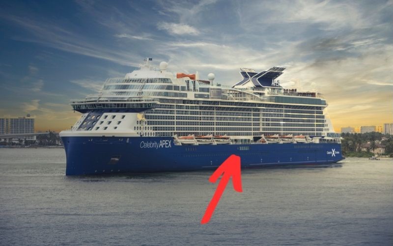 The Celebrity Apex cruise ship docked, with a red arrow pointing to Deck 3, set against a dramatic skyline and calm waters at dawn or dusk.