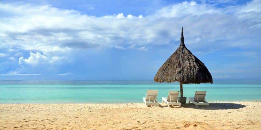 Deck Chairs and Umbrella on the Beach