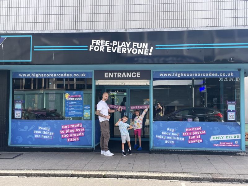 Family at High Score Arcade
