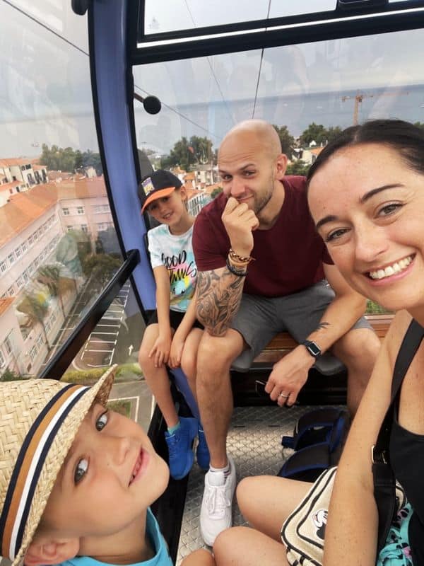 Family in Madeira riding a cable car