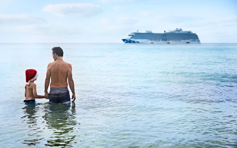 Father & Son Swimming In The Ocean, Caribbean Princess In The Background