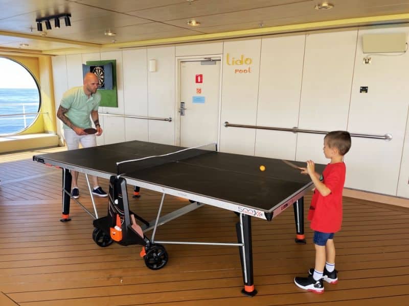 Father and son on Fred. Olsen Bolette playing table tennis