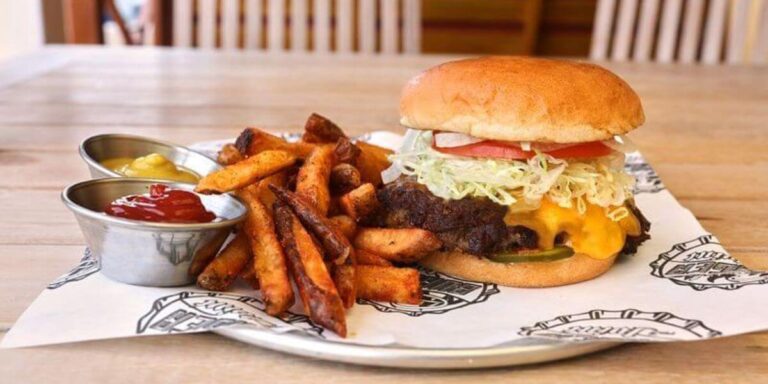 Appetizing chips and burger meal served on carnival cruise ships