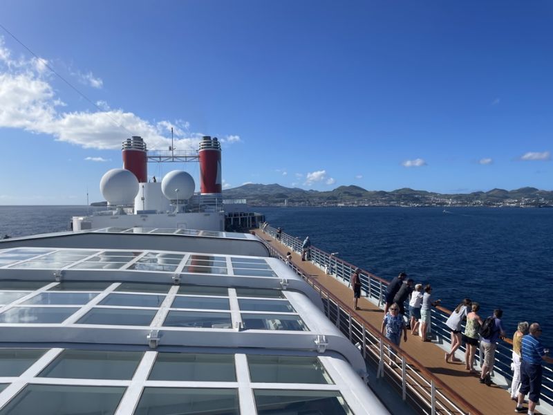 Guests on cruise ship looking at the sea