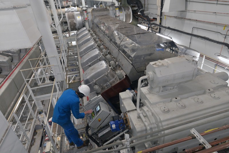 cruise ship engine next to person