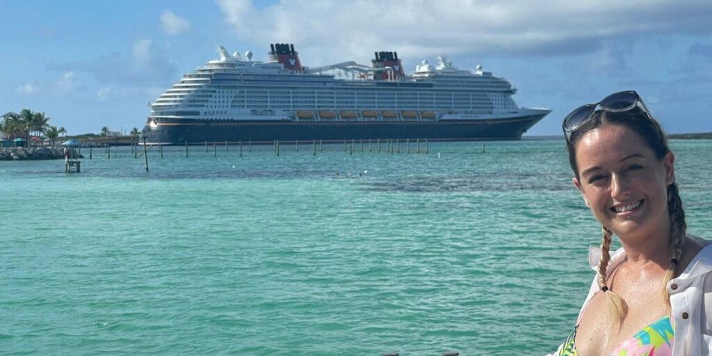 Me with the Disney Wish cruise ship at Castaway Cay