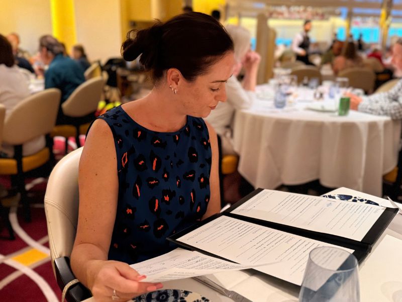 Jenni browsing the menu formal dining