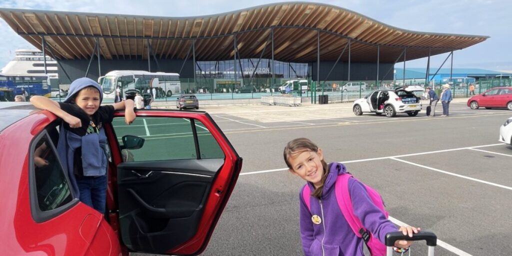 My kids getting out of the car at AB Parking at the Horizon Cruise Terminal in Southampton