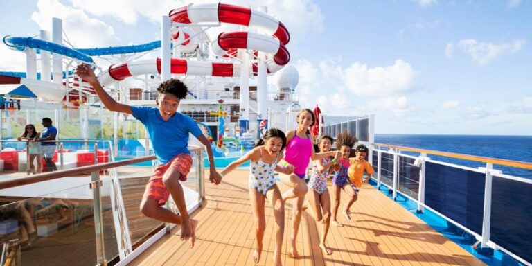 A group of joyful children racing towards the Waterworks aqua park on the deck of a Carnival Cruise ship, with clear blue skies above and the expansive ocean in the backdrop, highlighting the thrill and excitement of cruise ship activities for kids.