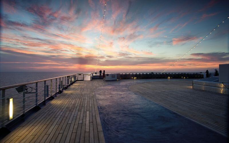 Lido deck on Carnival Conquest at sunset