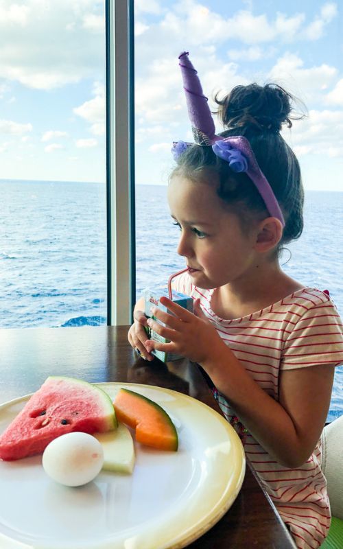 My daughter drinking before eating her plate full of fruit