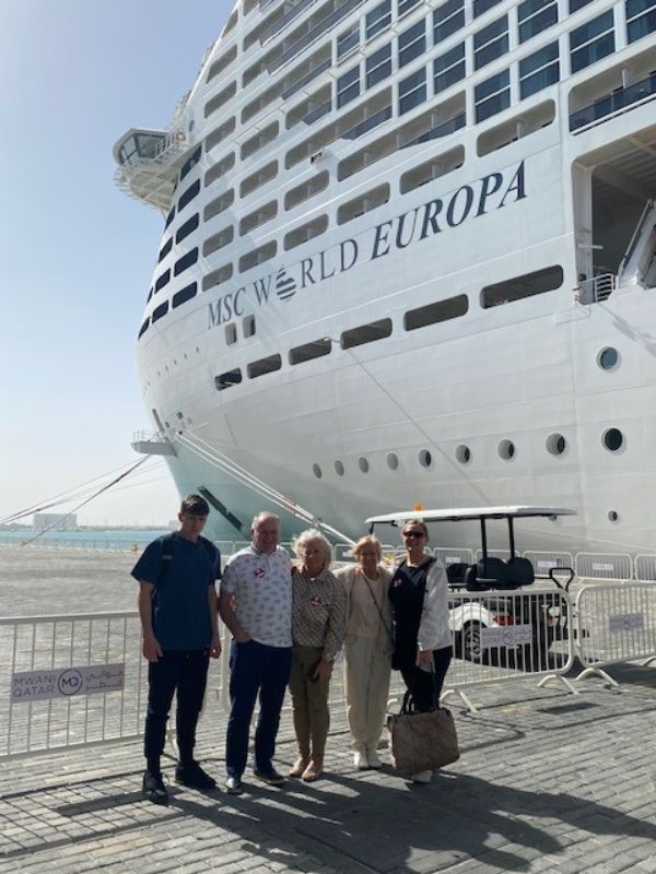 Lyndsey and family with MSC World Europa in the background