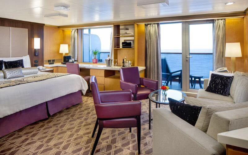 Neptune Suite bedroom on Holland America Line cruise ship