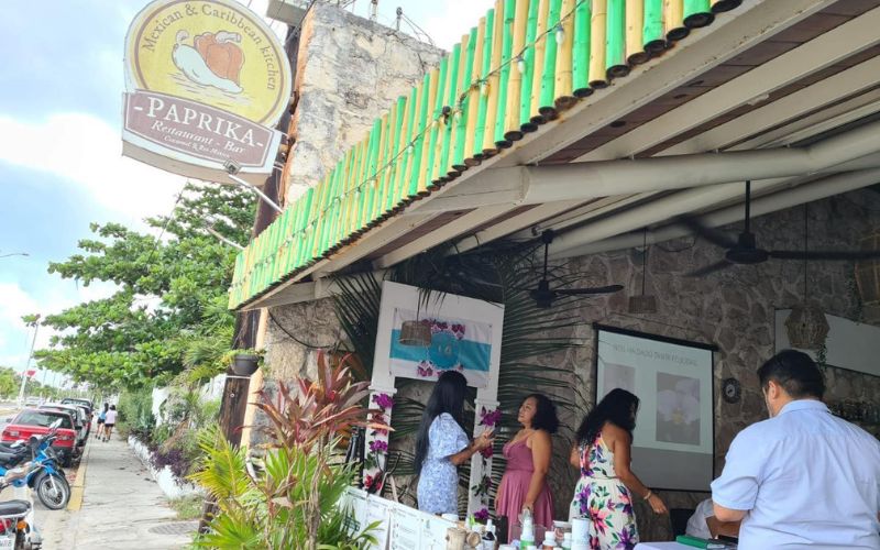 People inside Paprika Mexican & Caribbean Cuisine restaurant