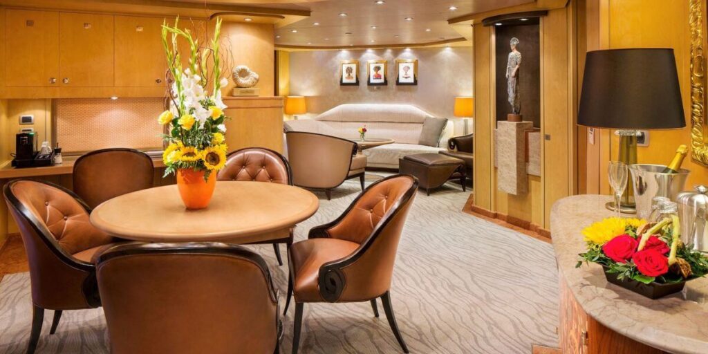 Pinnale Suite dining room on Holland America Line cruise ship