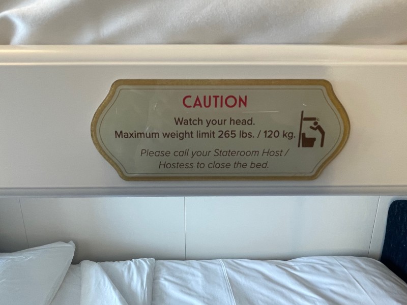 sign on Pullman bed on a Disney Cruise ship