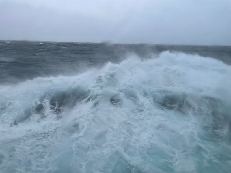 The view from a cruise ship window in rough seas