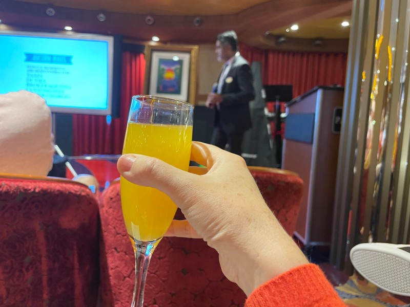 free mimosa at a Royal Caribbean art auction