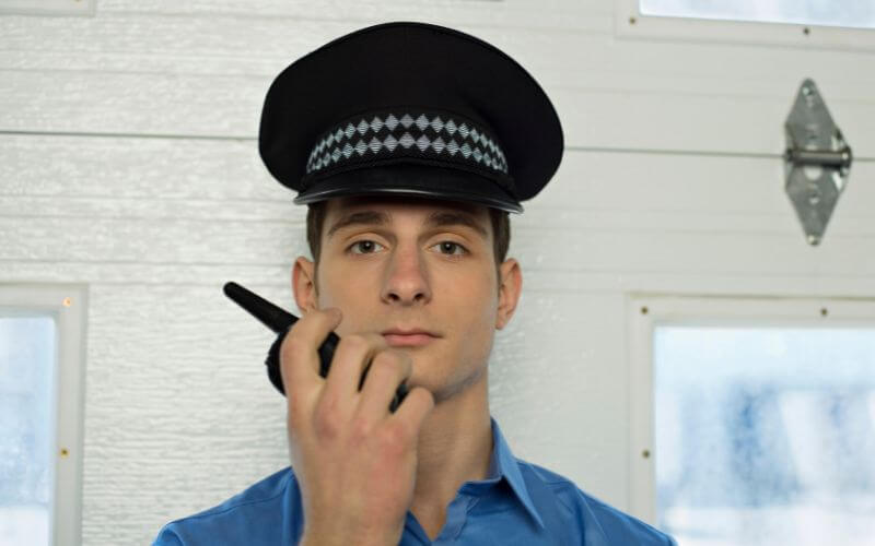 Security Guard Using Walkie Talkie