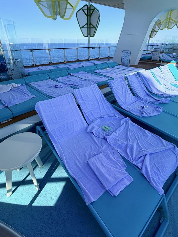 Towels reserving loungers on Legend of the Seas