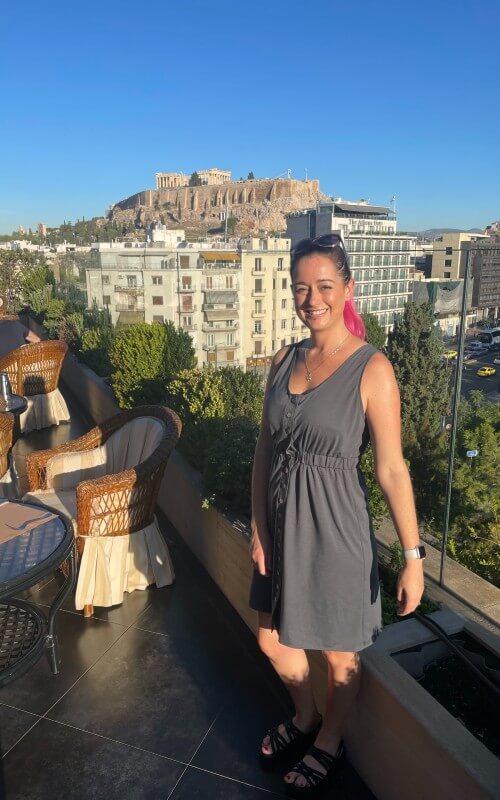 Woman standing on the roof deck of the hotel