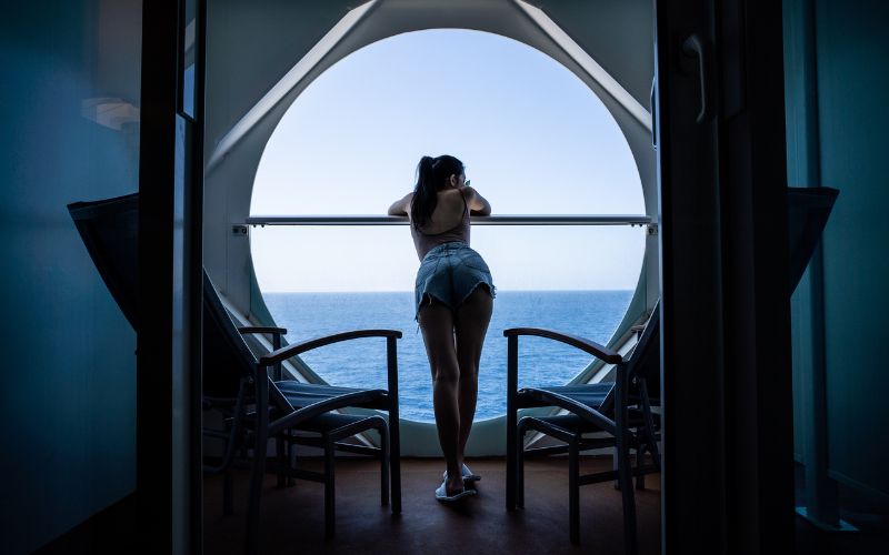 Woman relaxing on a cruise window