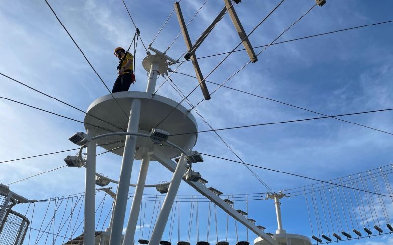 a person doing a high ropes course activity onboard a P&O cruise ship