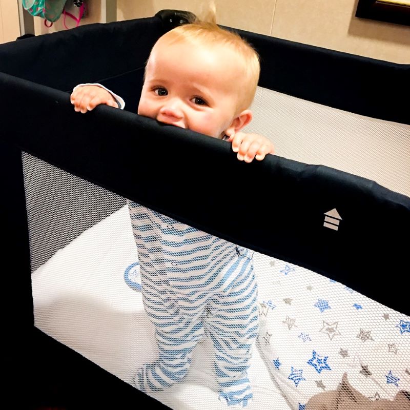 Baby in cot