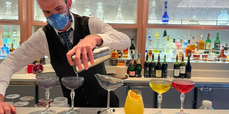 Bartender preparing Disney cruise drinks