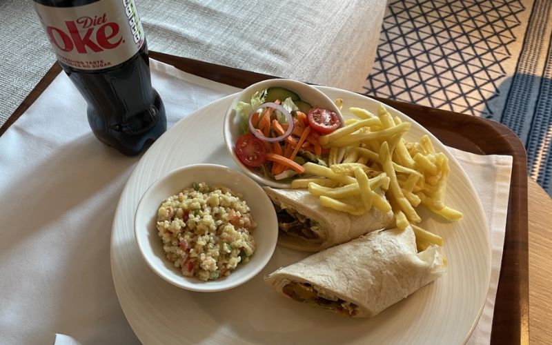 Burrito and French fries meal from room service on Iona